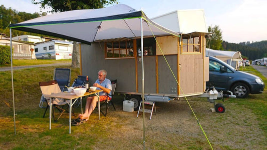 Construction of a composting toilet with external urine divider a self-built wooden caravan